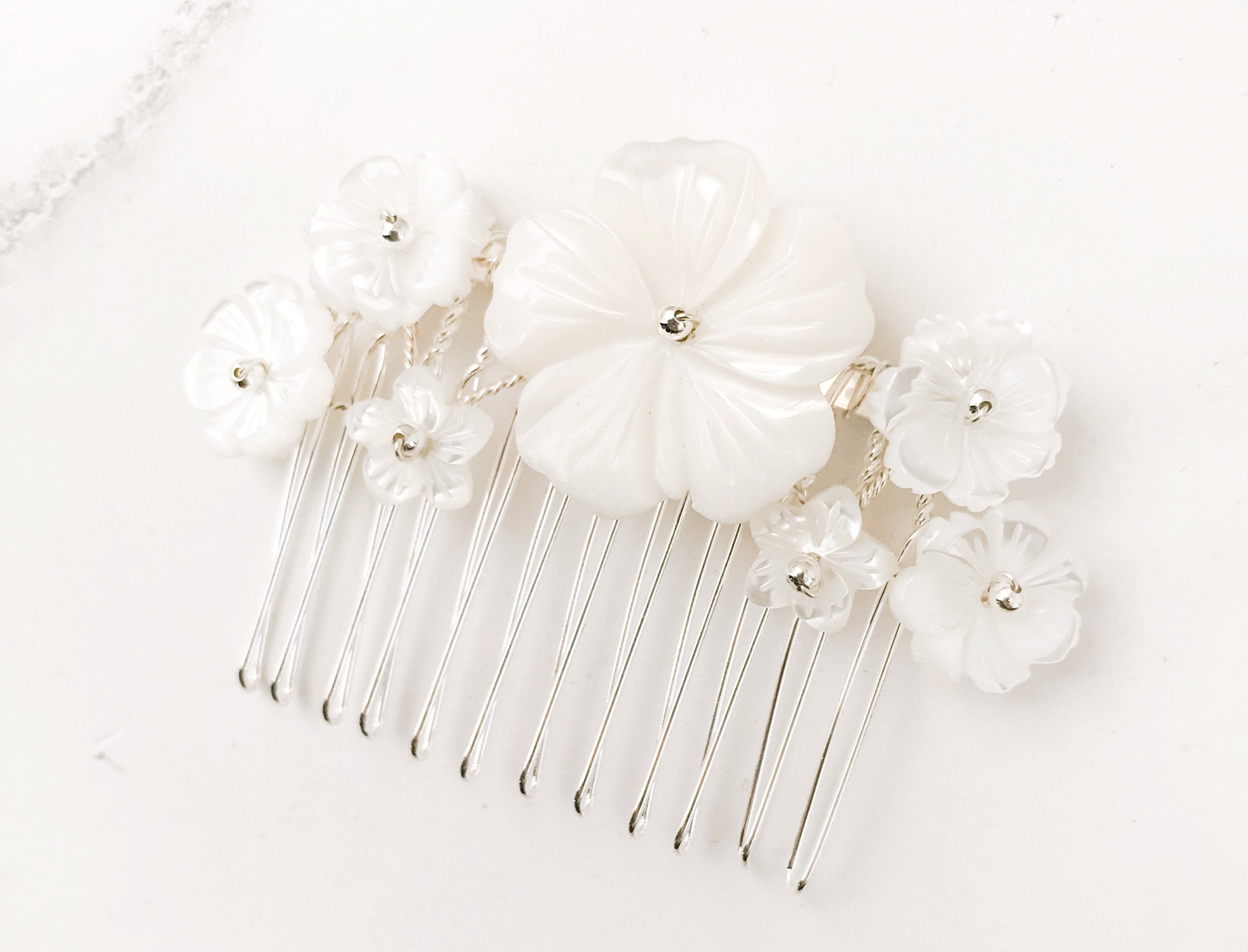 Silver Beth mother of pearl flower bridal comb