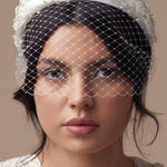 Embellished floral ivory padded headband with crystals and pearls and birdcage veil