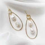 Edie gold statement baroque pearl sculptural earrings £95