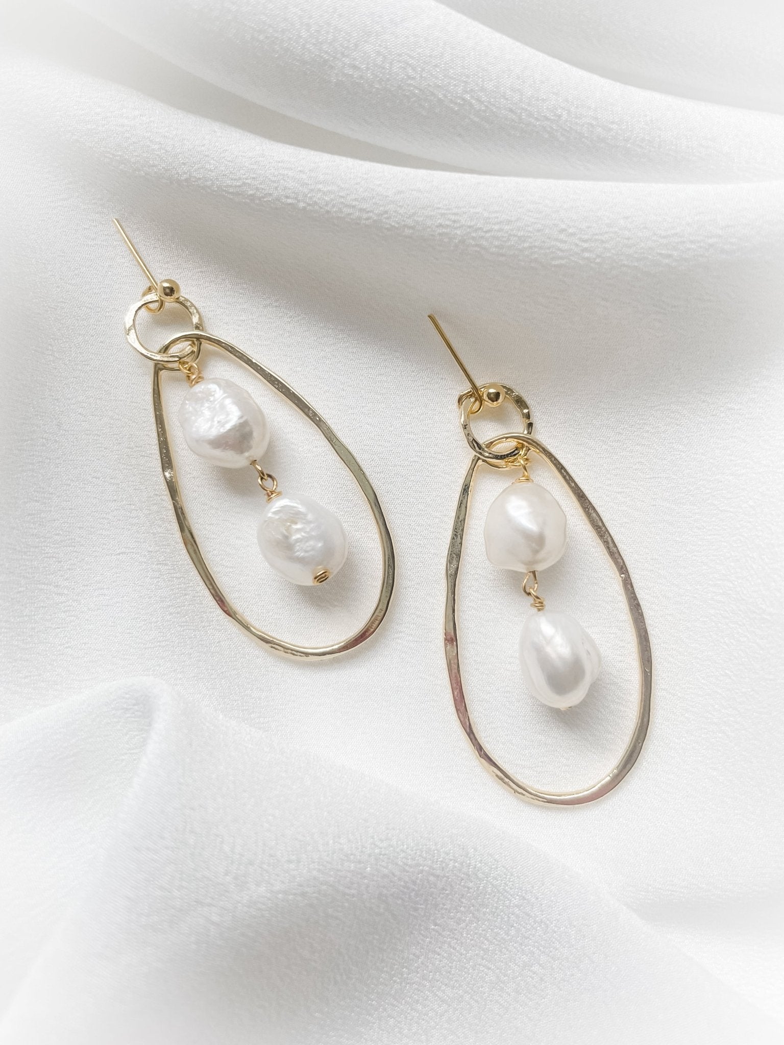 Edie gold statement baroque pearl sculptural earrings £95