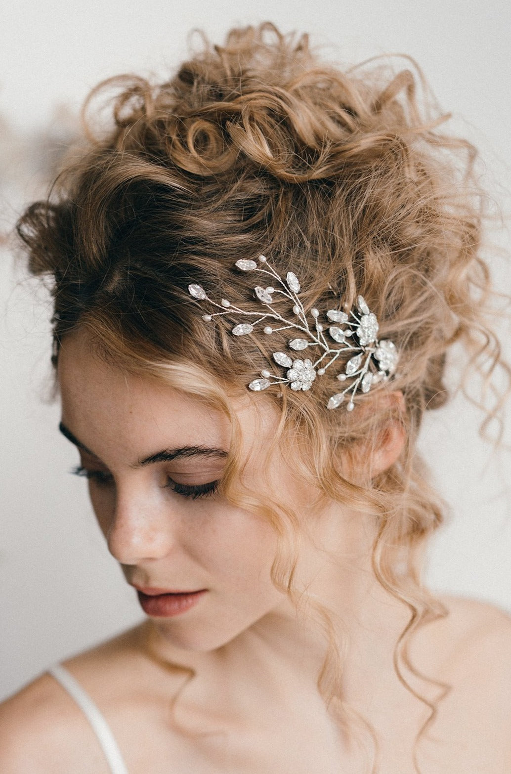 Small updo wedding hair vine