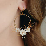 Flora silver gold hoop earrings with wire leaf detail