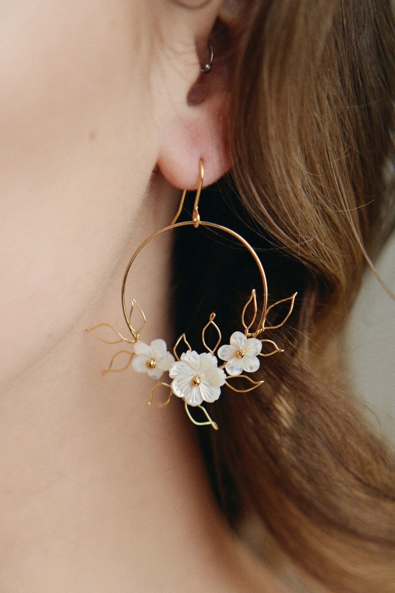 Flora silver gold hoop earrings with wire leaf detail