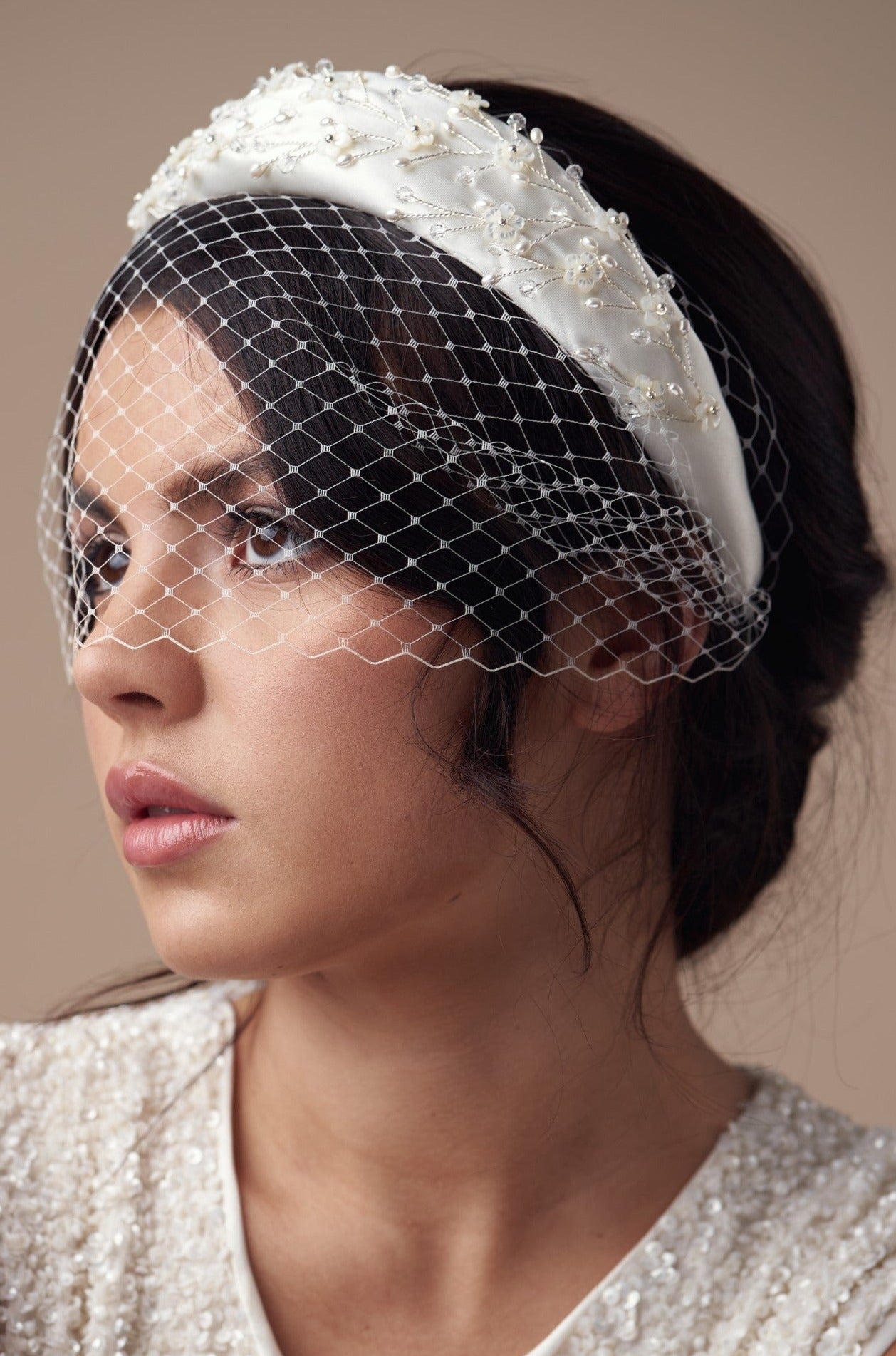 Embellished floral ivory padded headband with crystals and pearls and birdcage veil