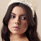 Embellished floral gold and ivory padded headband teamed with a golden crystal crown