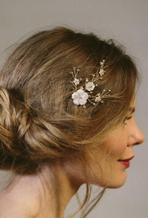 gold wedding comb with mother of pearl carved flowers and antique gold faceted round crystals