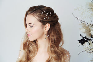 Gold Lunaria Swarovski Crystal star celestial hairpins and earrings worn with half up do