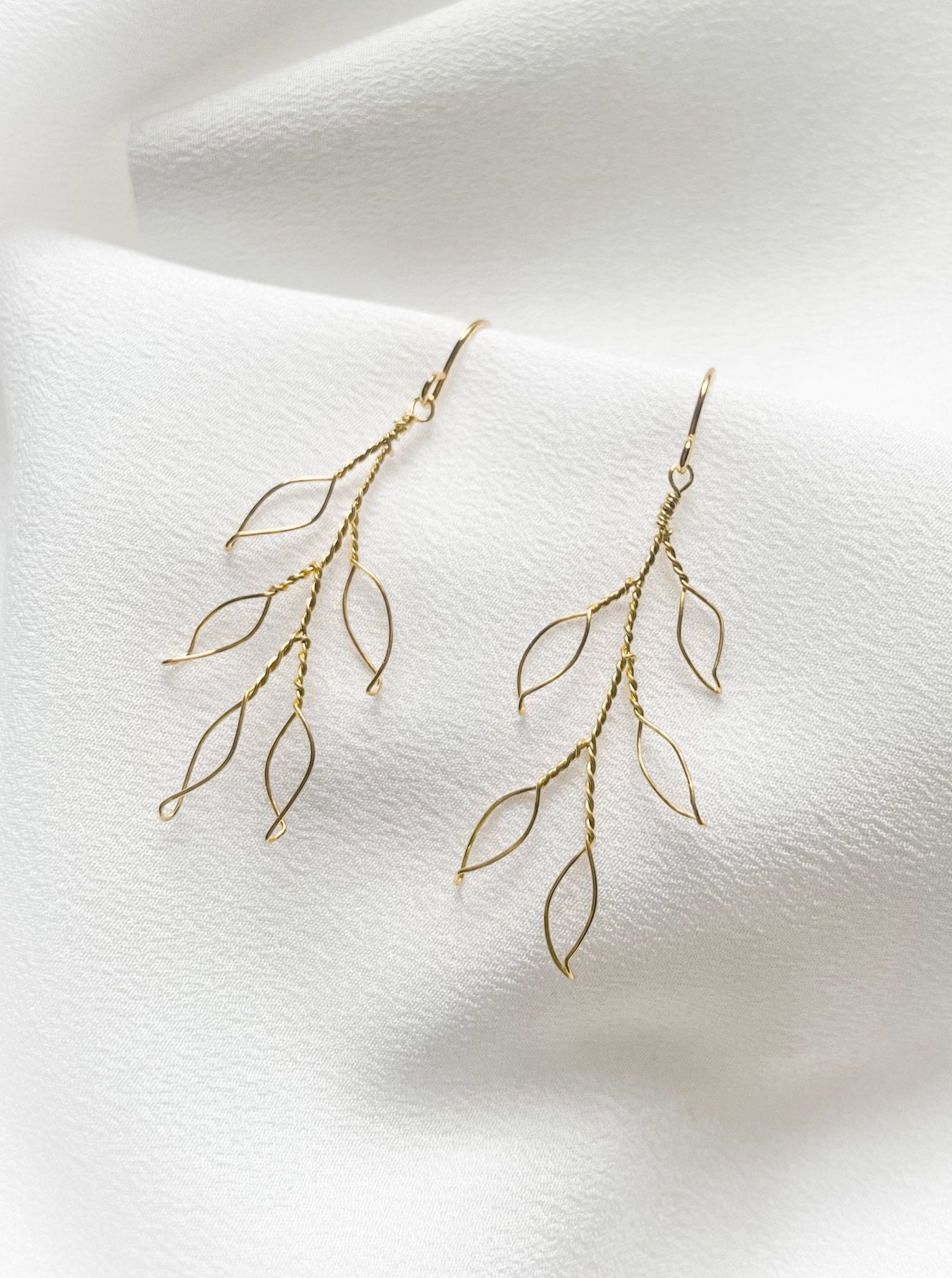 Neve delicate gold wire leaf earrings debbiecarlisle.com £35