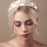 Short birdcage veil styled with Gold and Ivory  crystal padded headband