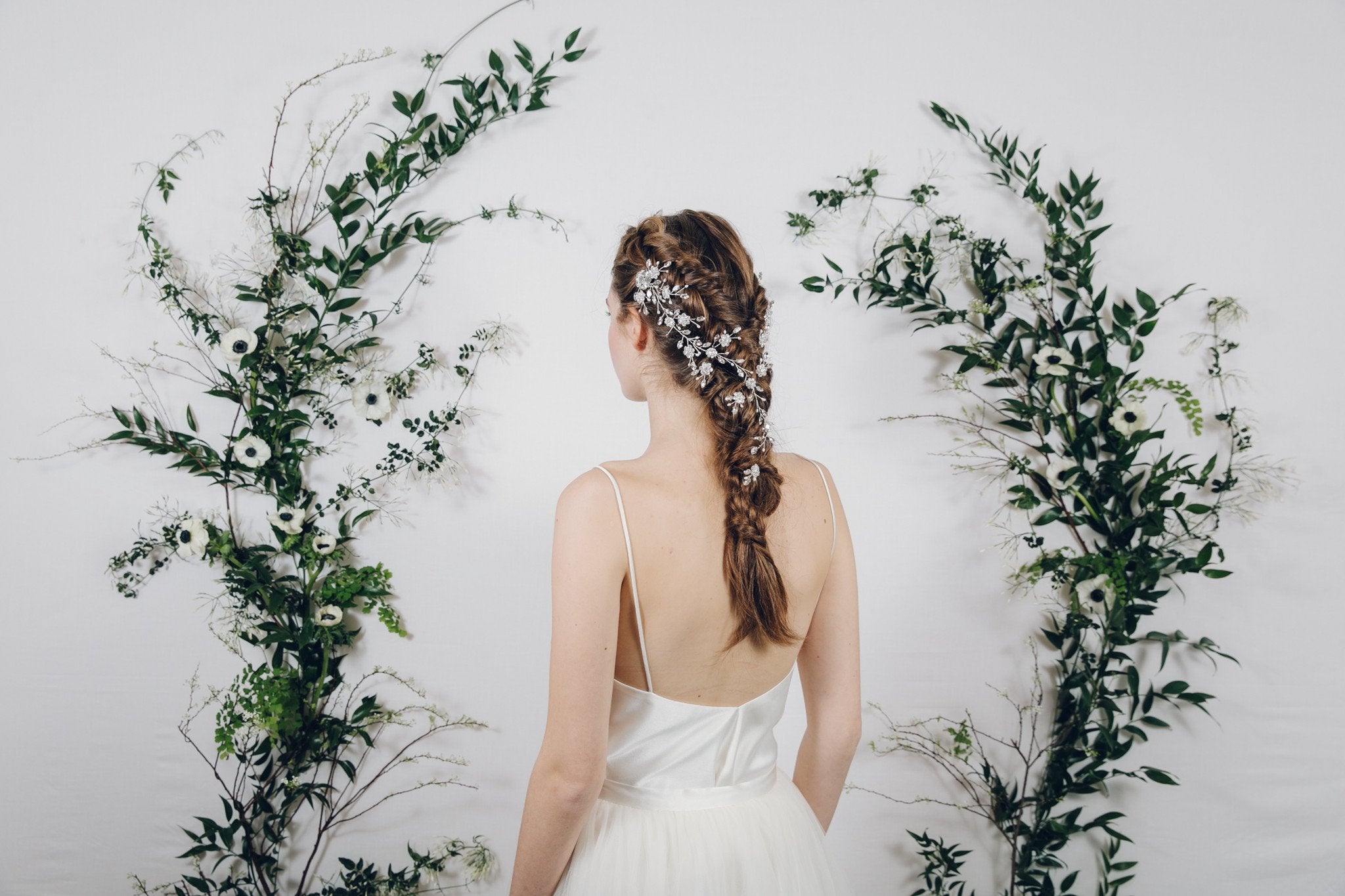 plait with bridal hair pins and hair vine 