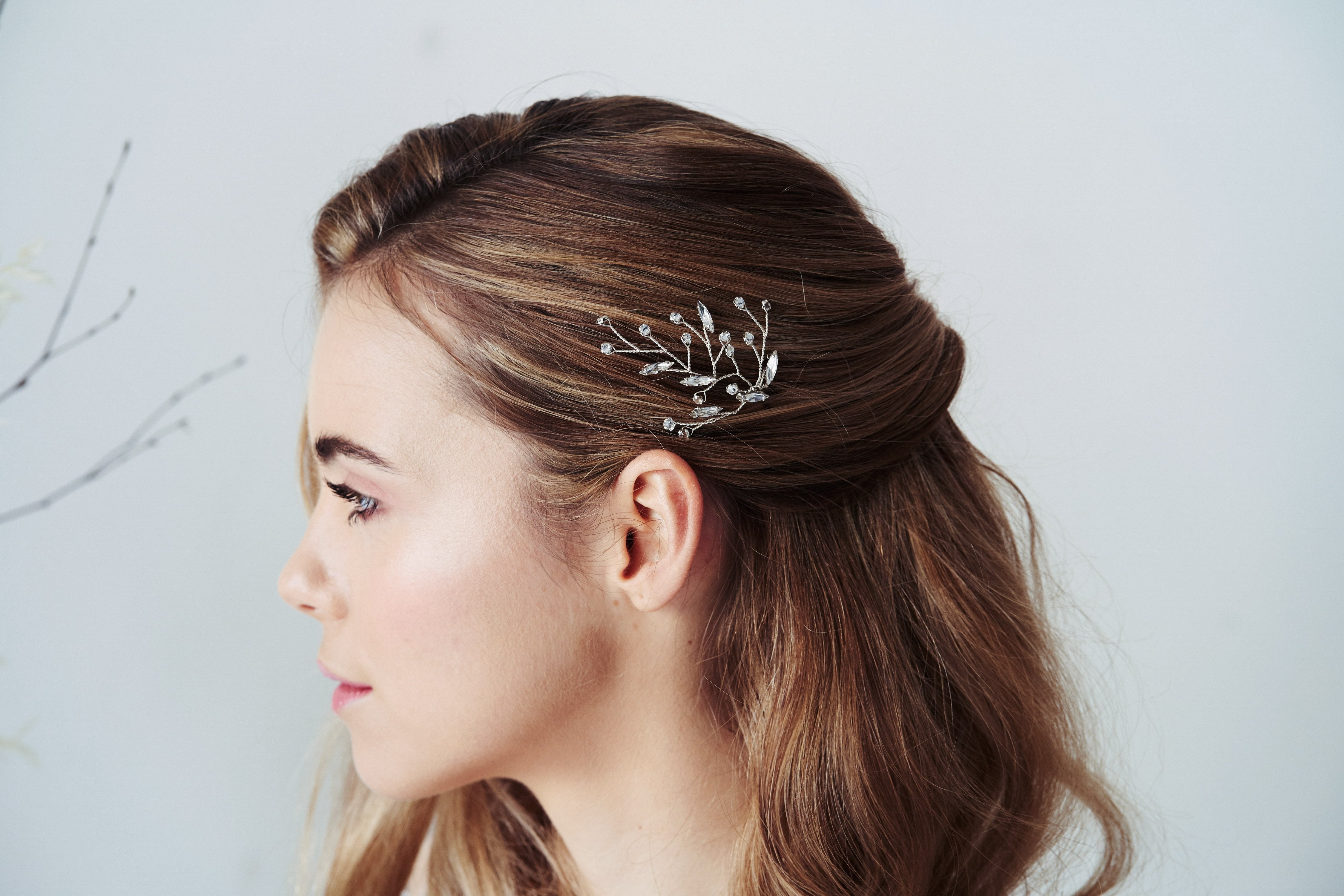 Single Silver Leaf Swarovski Crystal hairpin worn with half updo - Sophia