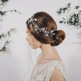 Trailing floral crystal and pearl bridal headpiece