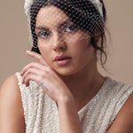 Ivory short birdcage wedding veil - mask style - worn under padded ivory satin headband with ivory and silver floral hand beading