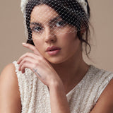 Ivory short birdcage wedding veil - mask style - worn under padded ivory satin headband with ivory and silver floral hand beading