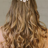 Rustic comb worn in the back of the head  with ivory flowers with gold crystals