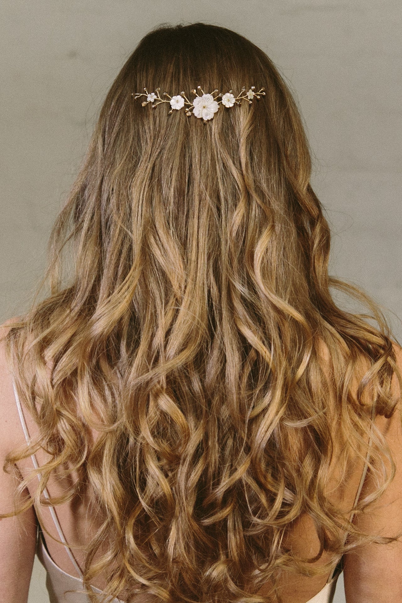 Rustic comb worn in the back of the head  with ivory flowers with gold crystals